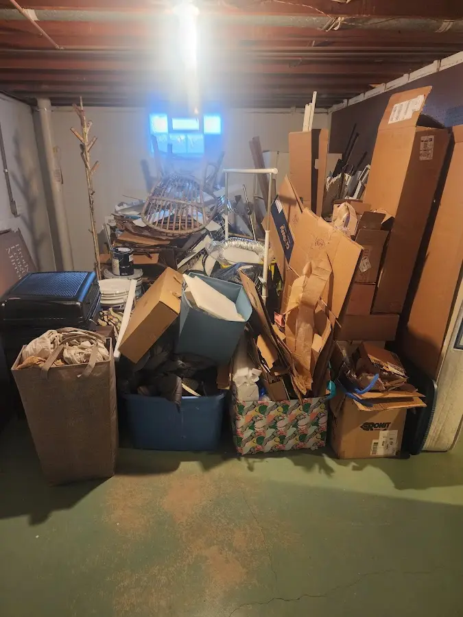 Roll-off dumpster container at job site for 4 Yard Dumpster Rental in Brier